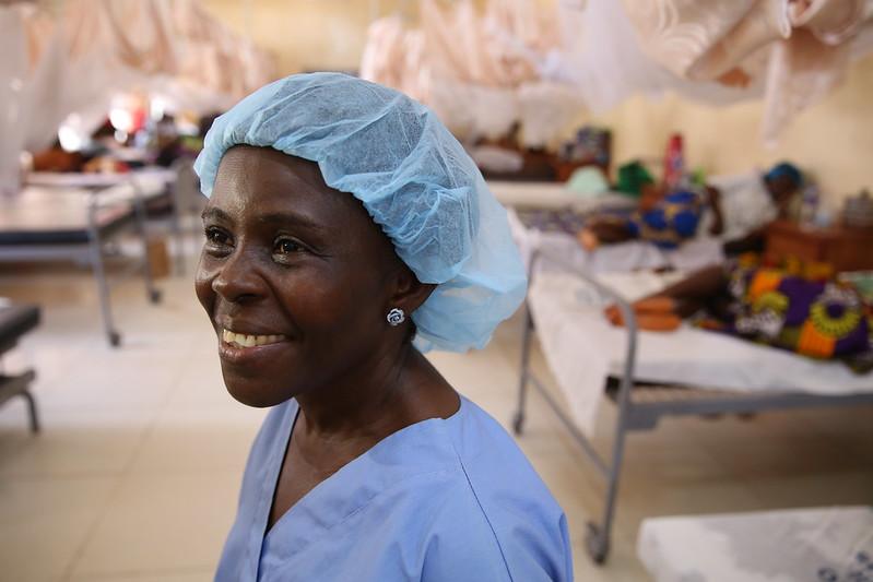 Female nurse in rural hospital with blue nurse clothes on