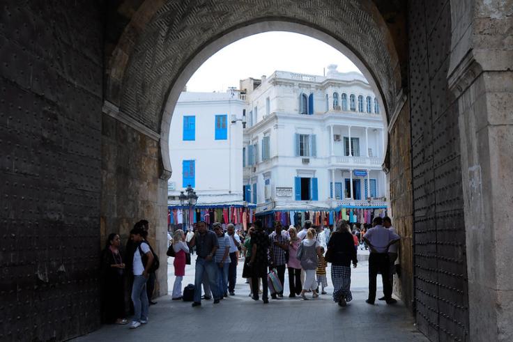 Entrance to Medina, Tunisia with a large crowd of people